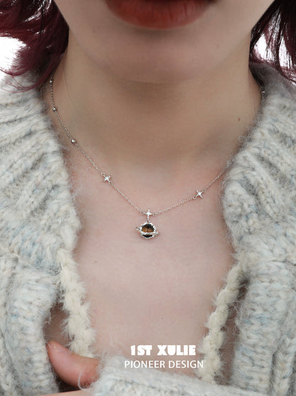 1STXULIE desert planet necklace with star accents and a unique gemstone centerpiece
