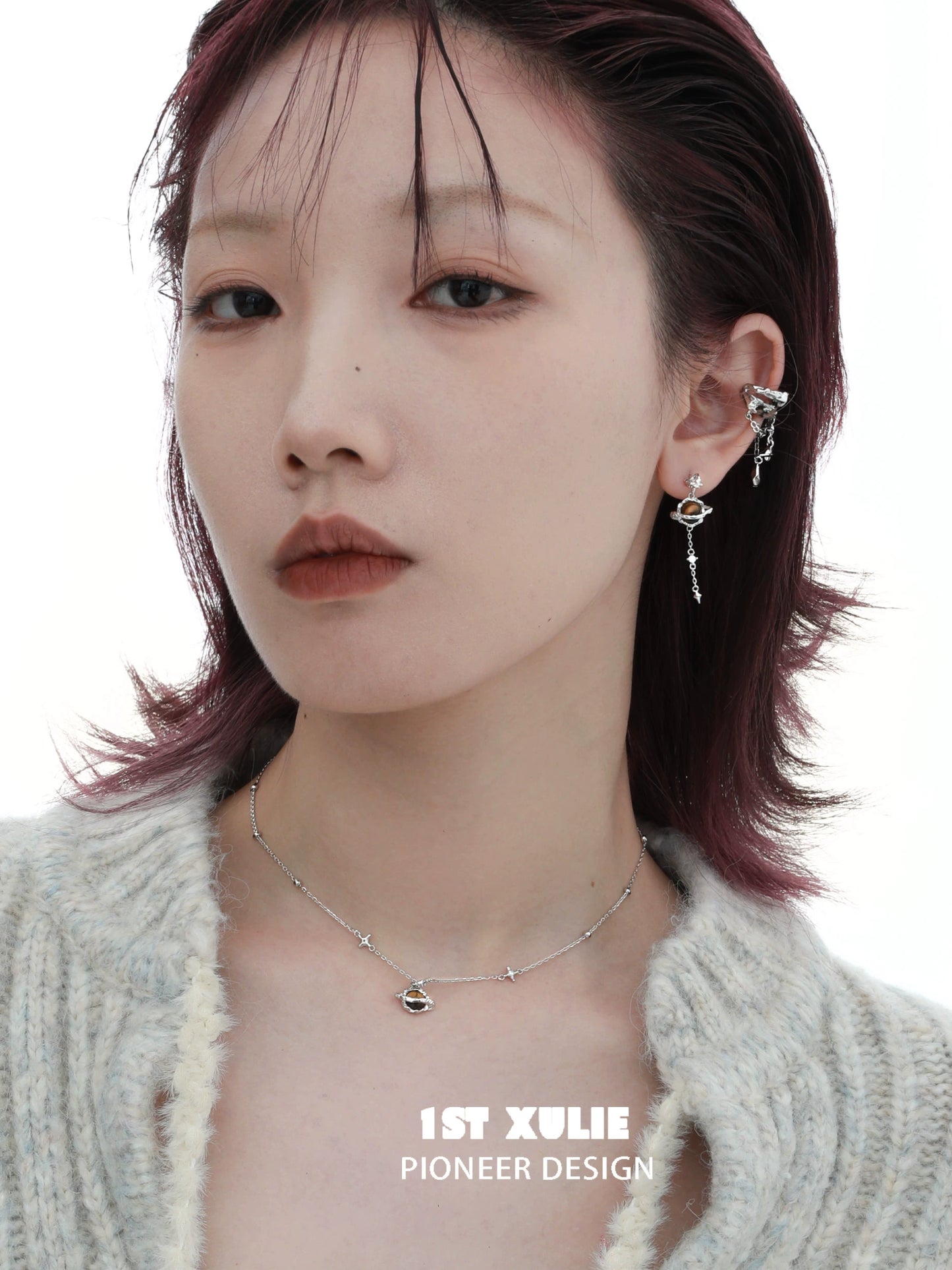1ST XULIE desert planet necklace showcased on model with a stylish outfit and contemporary jewelry