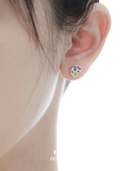 Dopamine earrings colorful studs worn on the ear, featuring vibrant designs and a unique style