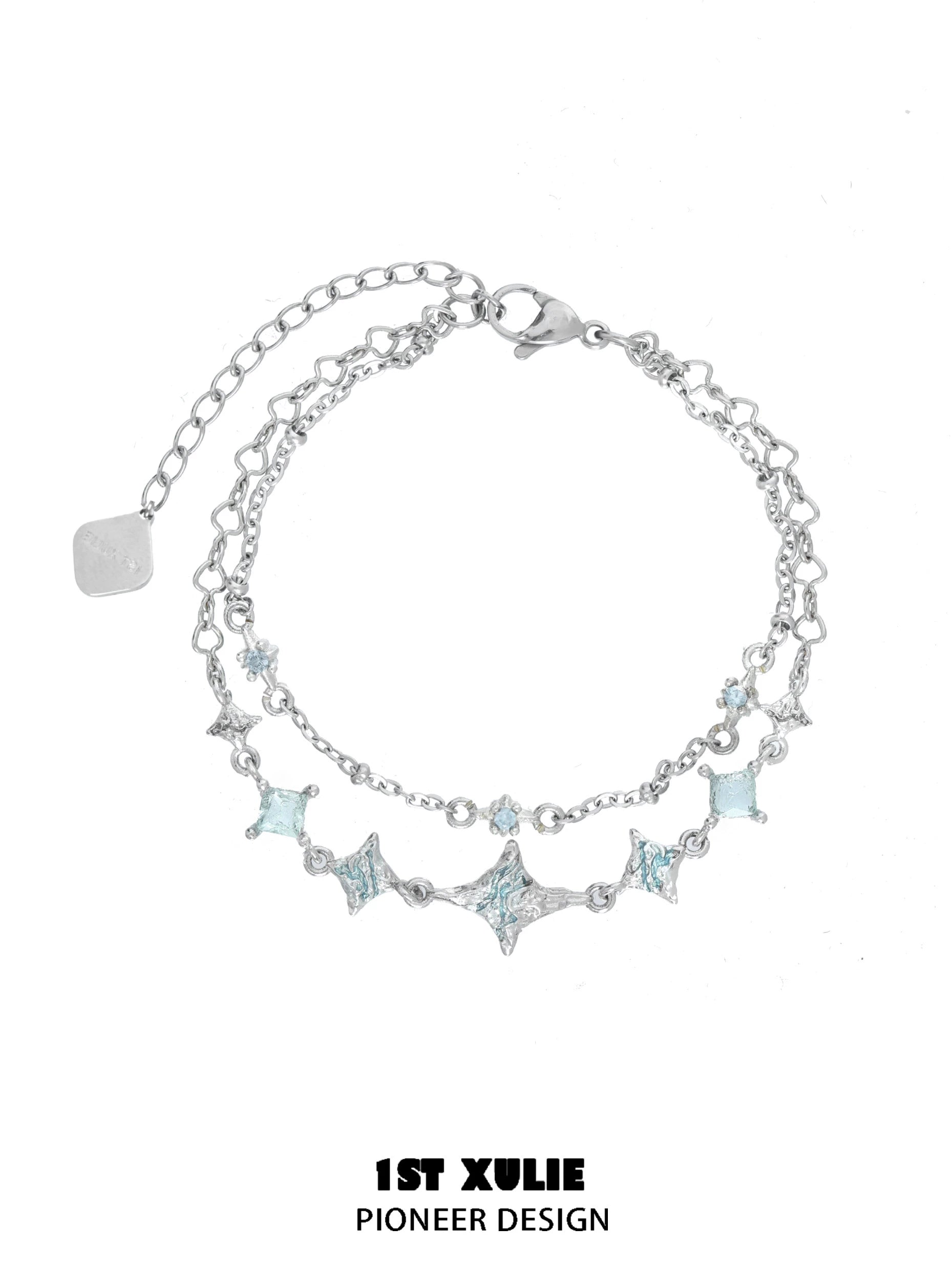 Elegant double layer starfish silver bracelet featuring sparkling star and gem accents