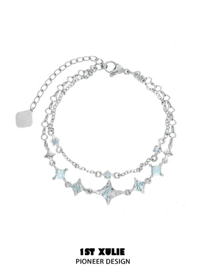 Elegant double layer starfish silver bracelet featuring sparkling star and gem accents