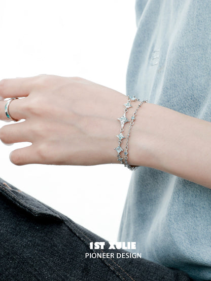 Stylish double layer starfish silver bracelet worn on a wrist for a trendy look