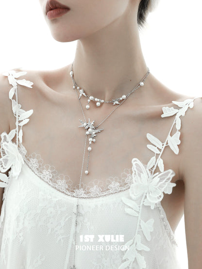Elegant 1STXULIE dream wings pearl necklace featuring a butterfly design and delicate pearls