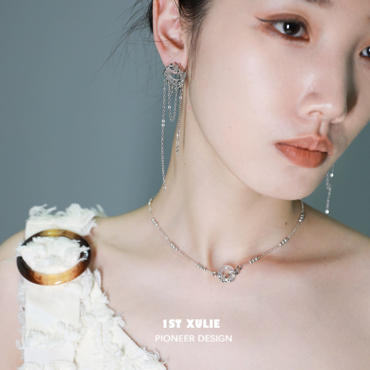 Model wearing an elegant eternal rings silver necklace with unique design for a modern look