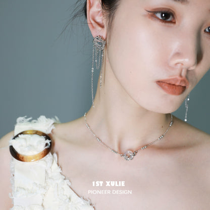 Model wearing an elegant eternal rings silver necklace with unique design for a modern look