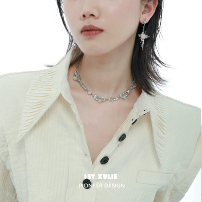 Frost Goddess beaded necklace from 1ST XULIE, featuring delicate silver accents and a unique design.