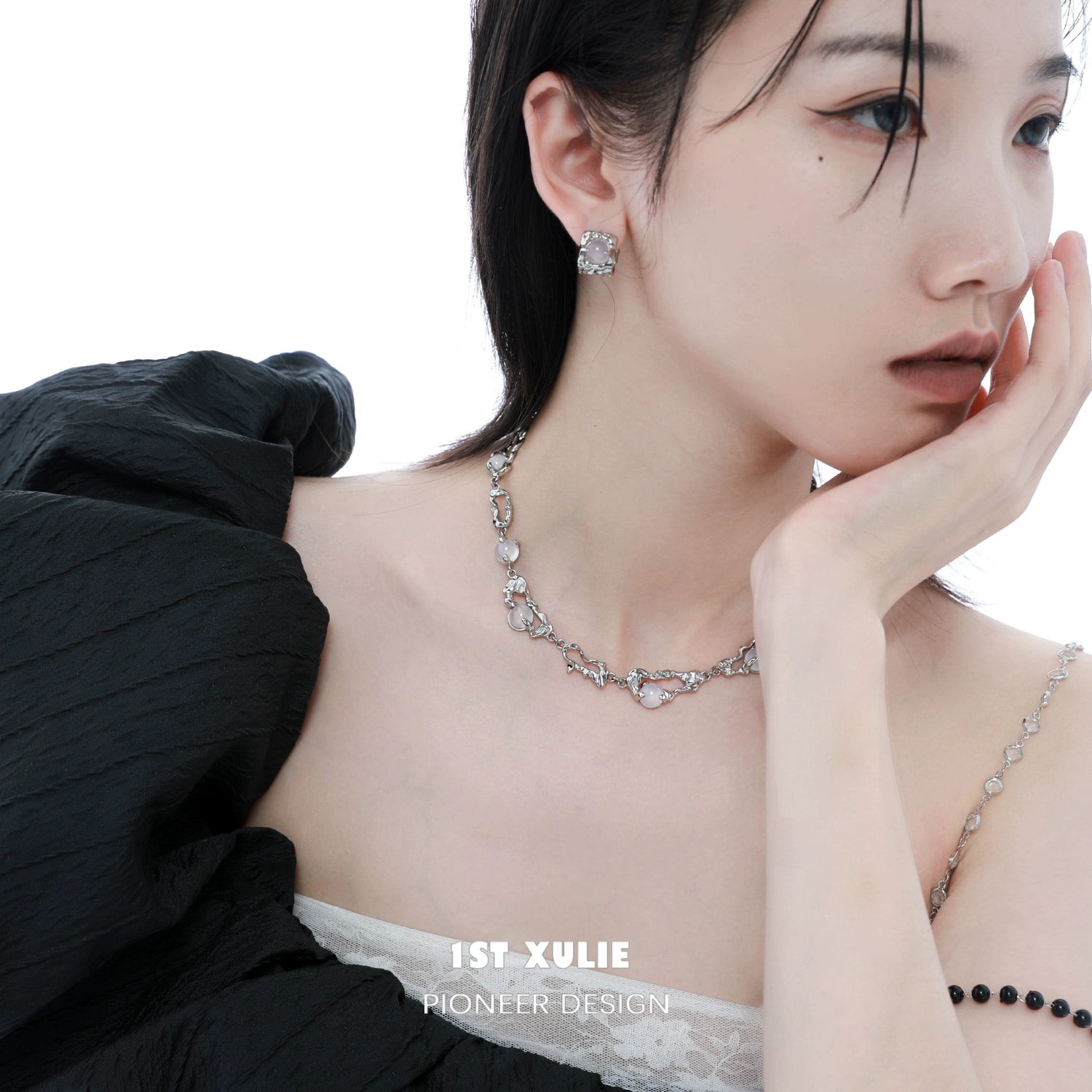 Model wearing a frost goddess beaded necklace paired with elegant earrings for a sophisticated look