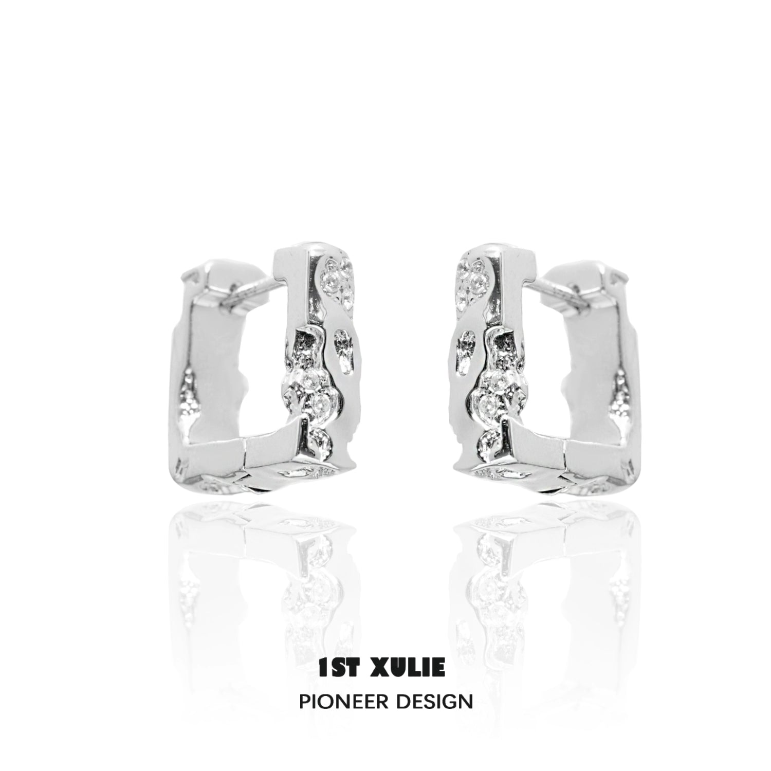 Frosted geometric earrings designed by 1STXULIE with unique cut and modern finish.