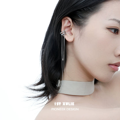 Fashionable frozen tassel ear clip displayed on a model with elegant hairstyle