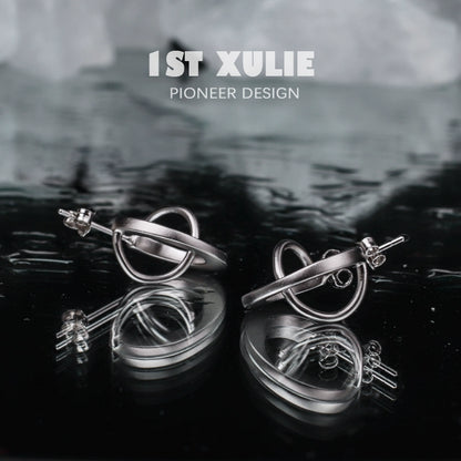 Futuristic silver geometric earrings designed with a modern and creative aesthetic