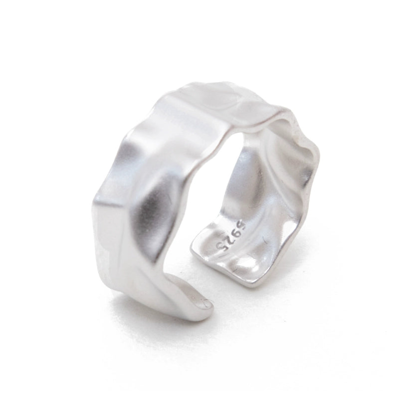 Futuristic silver ring with a unique wave design for modern fashion enthusiasts