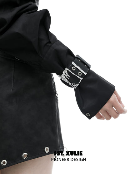 Gothic liquid metal arm bracelet on a black shirt sleeve, showcasing a stylish and edgy design