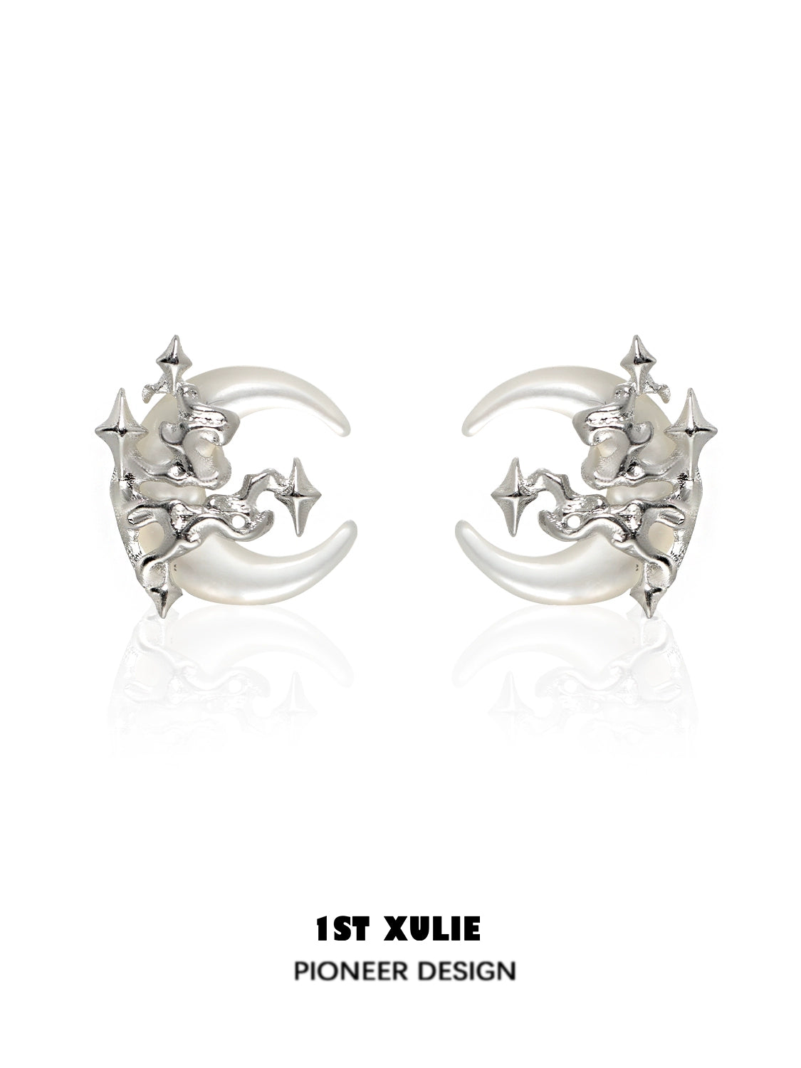 Silver gothic moon earrings featuring intricate designs and star accents for a unique look