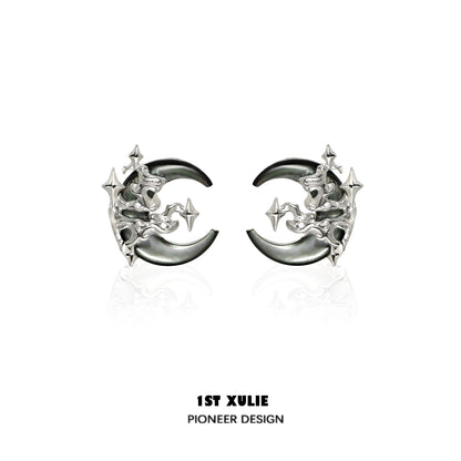 Gothic moon earrings in silver featuring intricate star and crescent designs for a unique accessory