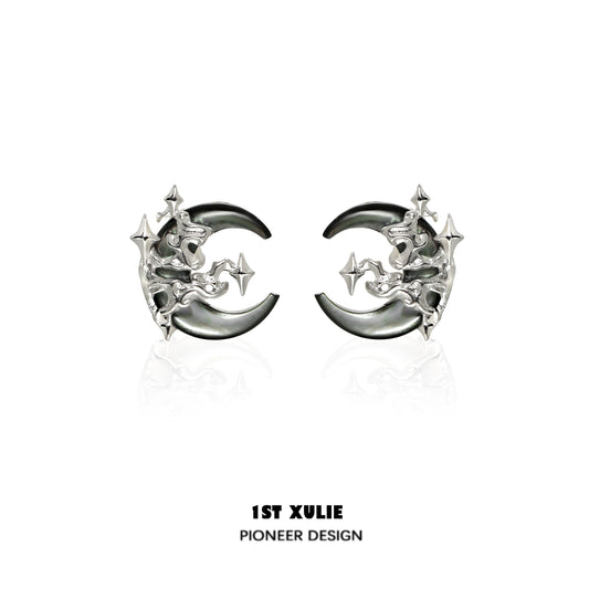 Gothic moon earrings in silver featuring intricate star and crescent designs for a unique accessory