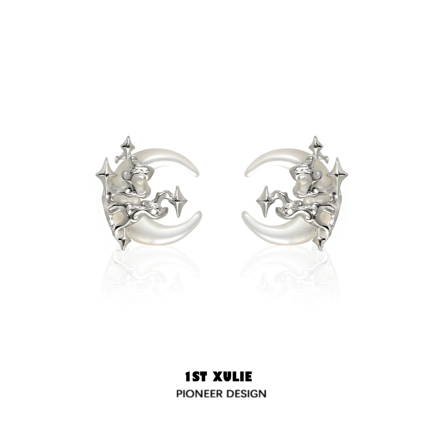 Silver gothic moon earrings featuring a unique celestial design with intricate star details