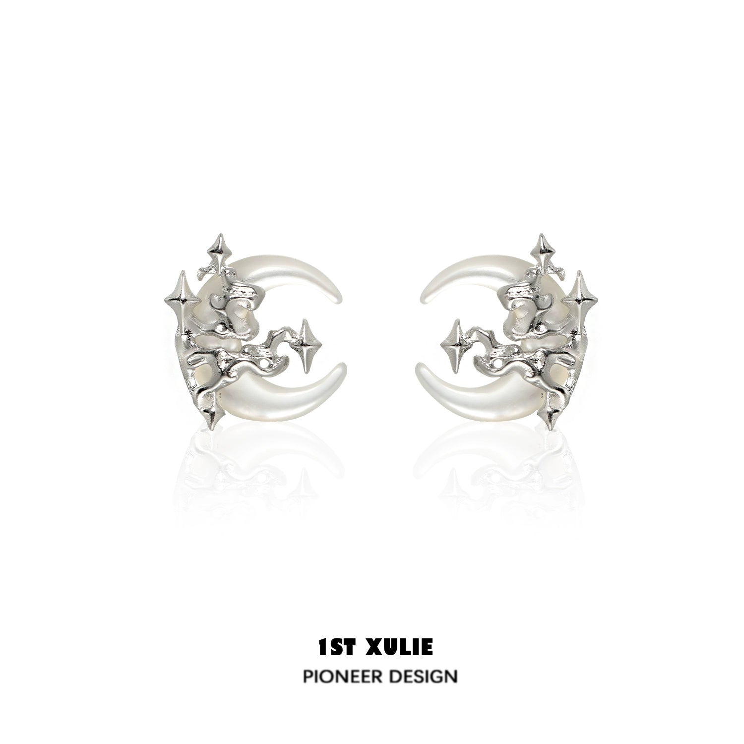 Silver gothic moon earrings featuring a unique celestial design with intricate star details