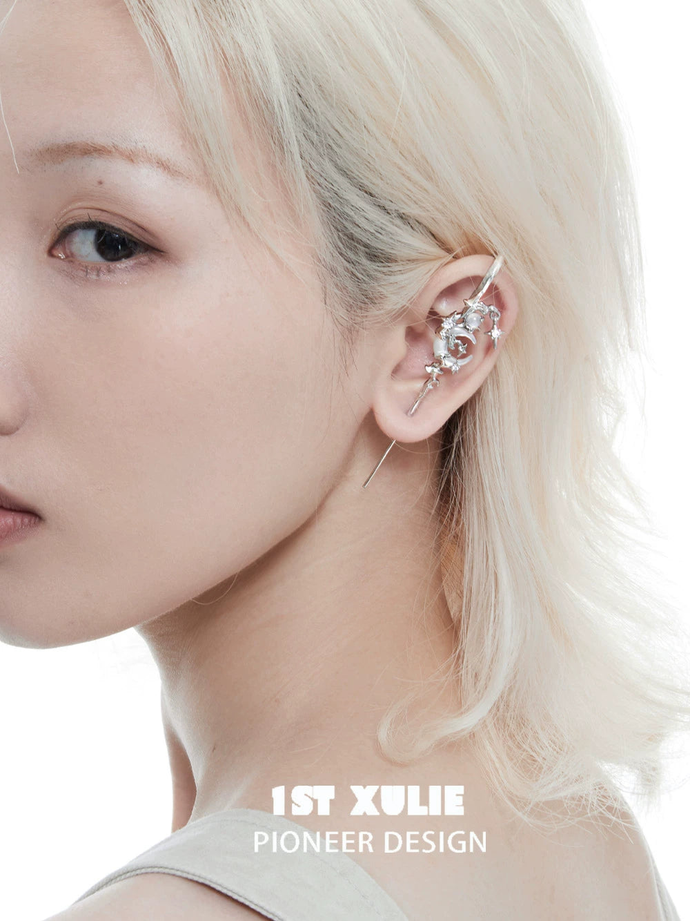 Stylish model showcasing 1ST XULIE gothic moon earrings with unique design and shimmering details