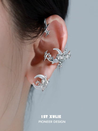 Gothic moon earrings featuring intricate star and moon designs in silver for a unique accessory look