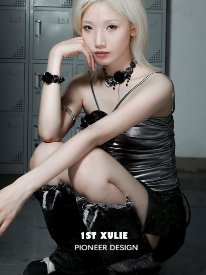 Gothic rose clavicle necklace worn by model with silver top and edgy fashion style