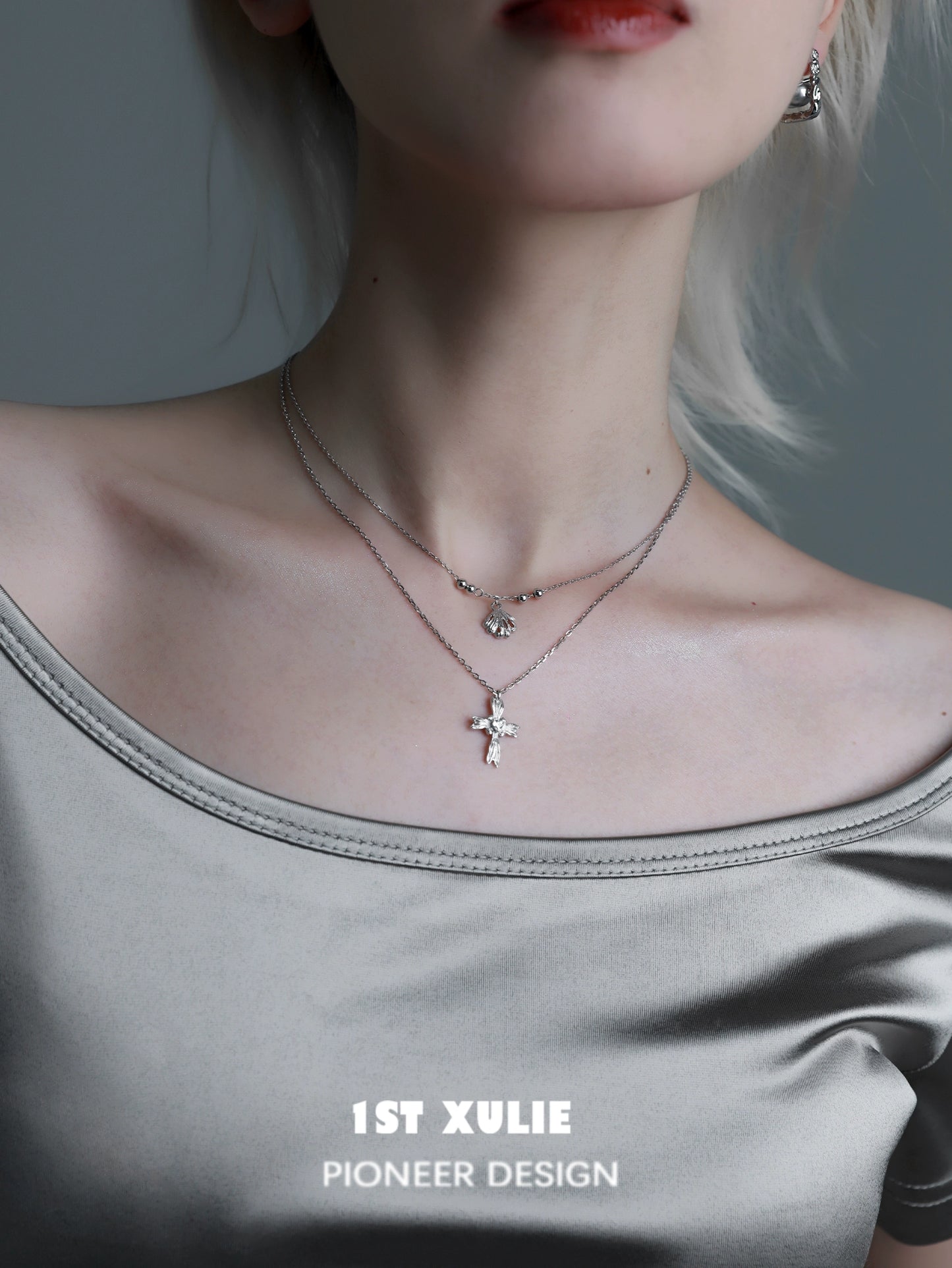 Gray pearl silver double layer necklace featuring a star charm and elegant design