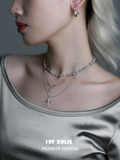 Stylish gray pearl silver double layer necklace worn with trendy outfit for elegant look