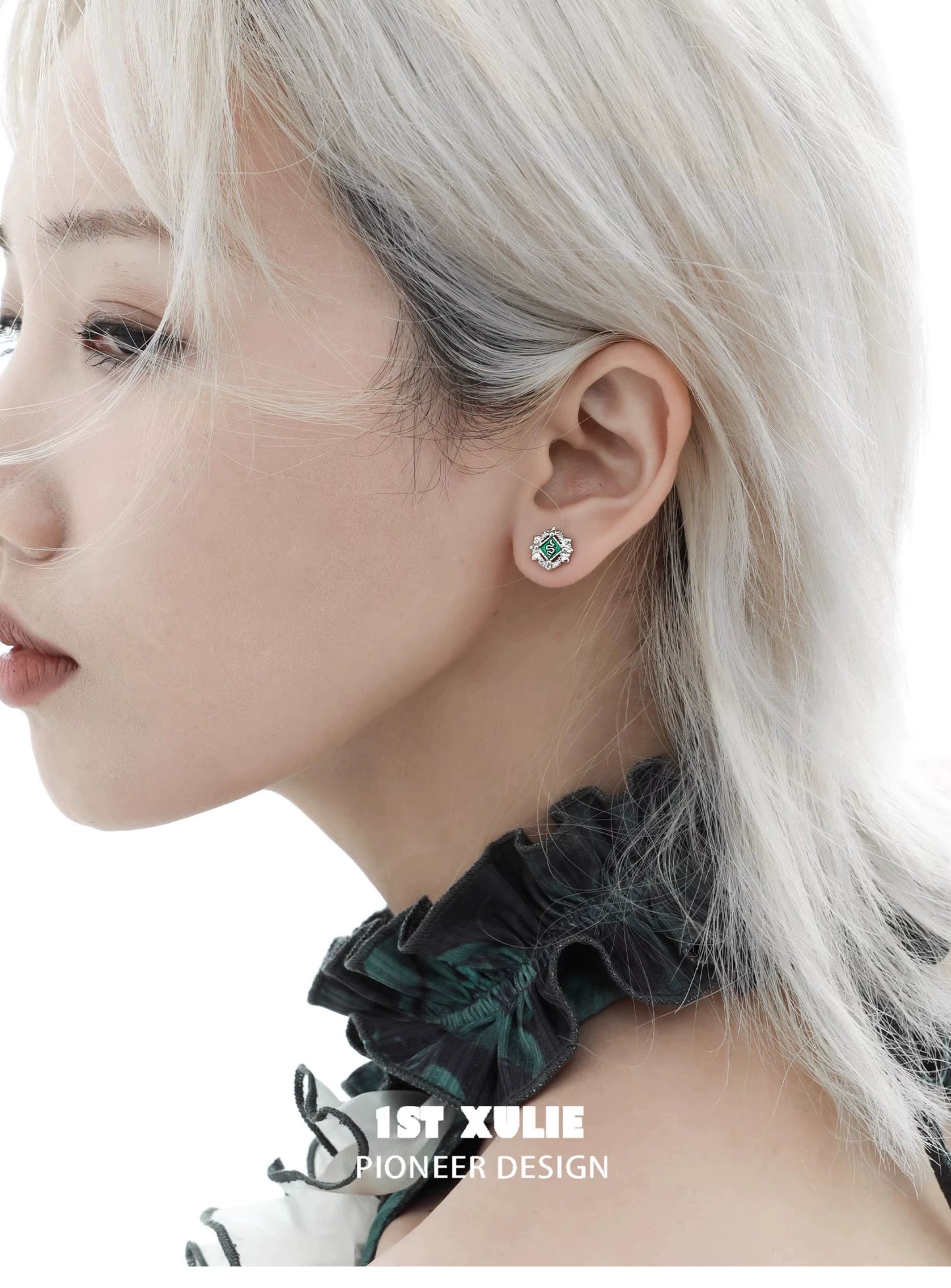 Elegant green serpent ear cuffs featuring intricate design for a stylish look