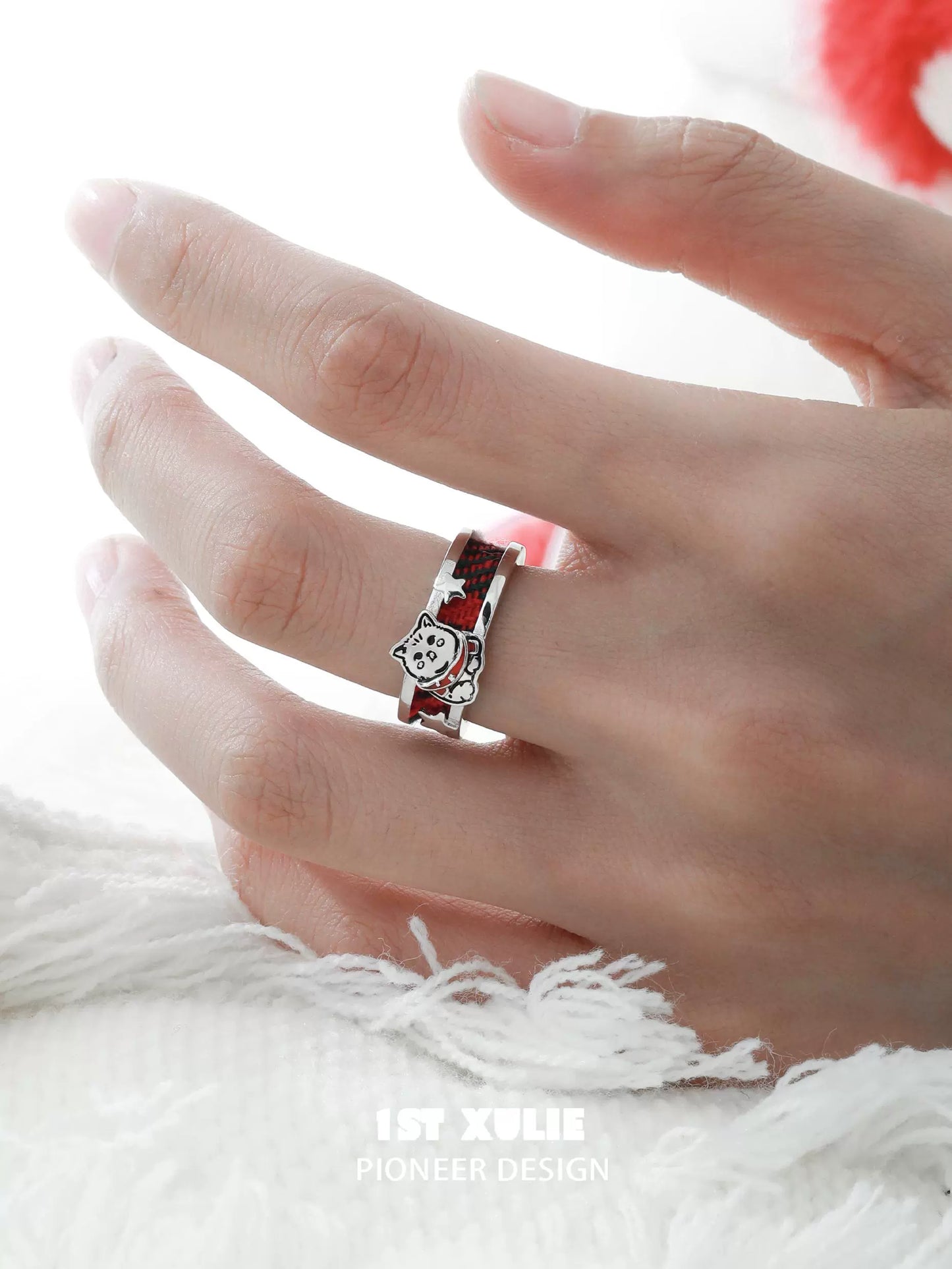 Happy cat dog silver ring on a hand showcasing a playful design for pet lovers