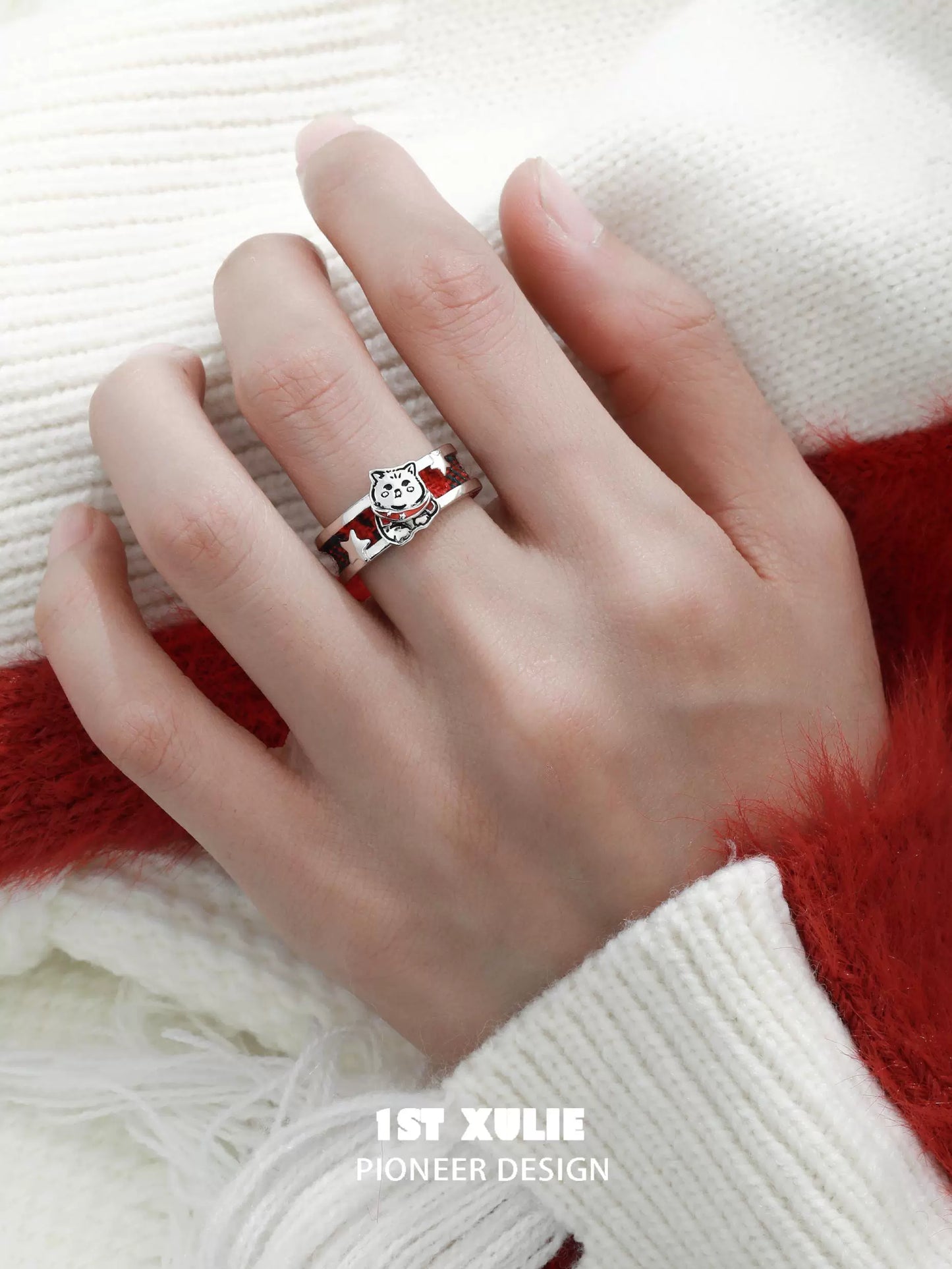 Happy cat dog silver ring featuring a cute design on a stylish hand with a cozy sweater