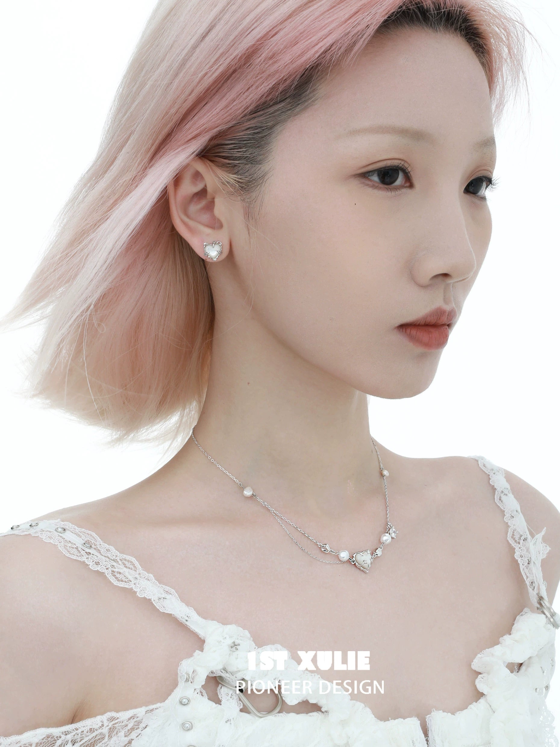 Elegant heart ear clips for women by 1STXULIE, complementing a delicate outfit