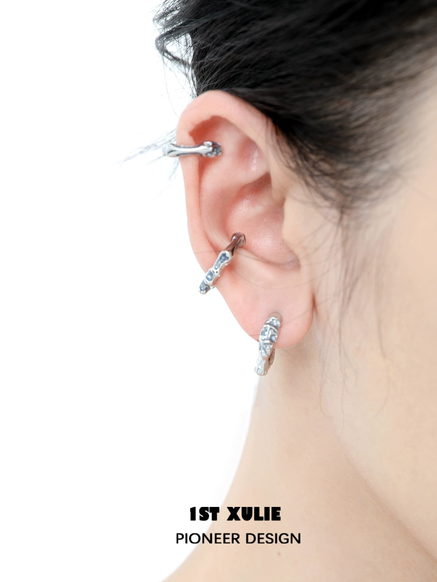 Stylish 1STXULIE Icelandic snowfall earrings showcased on an ear for a modern look