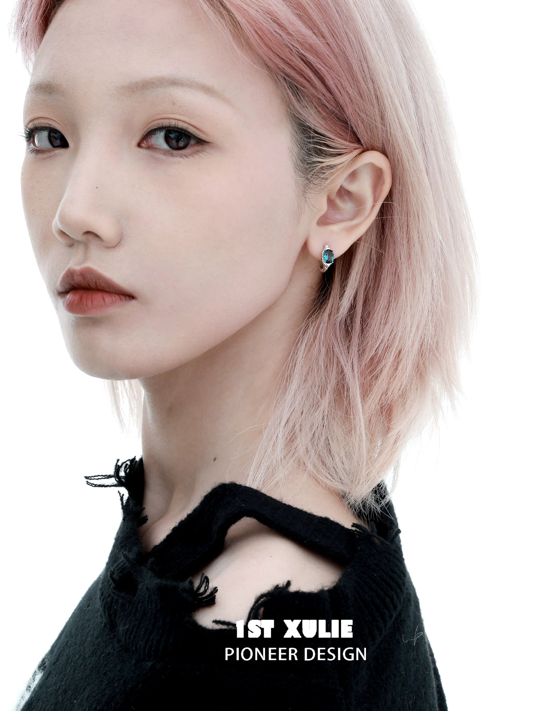 Model wearing Icelandic zircon ear cuffs showcasing modern design and elegant style