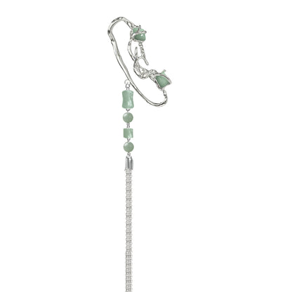 Elegant jade cascade ear clip featuring cascading jade beads and a silver design