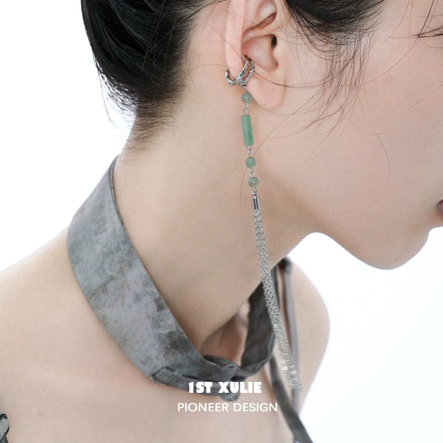 Jade cascade ear clip from 1STXULIE featuring elegant detailing and a modern design