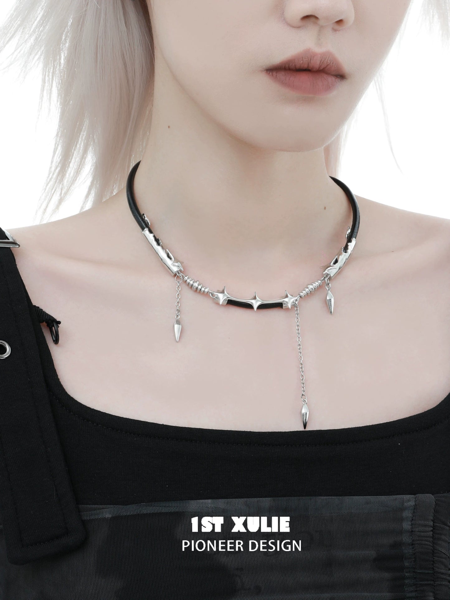 Midnight talisman leather necklace featuring a bold design with silver spikes for a striking look