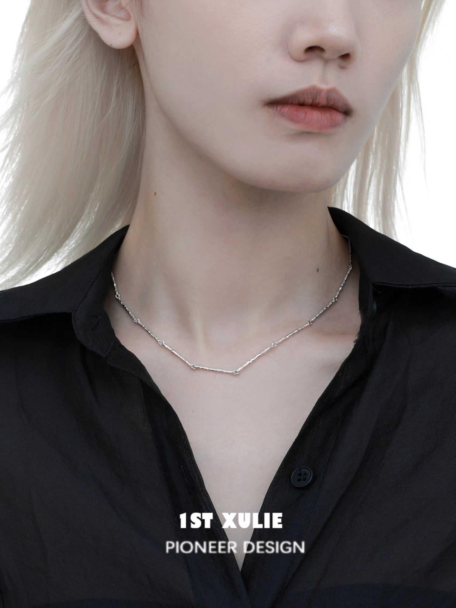 Minimalist bamboo necklace from 1STXULIE featuring a sleek and modern design worn on a model