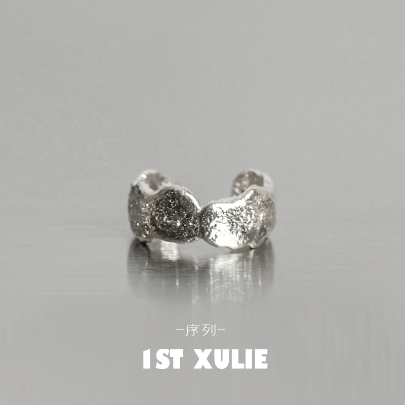 Minimalist frosted ear cuffs in silver with a unique textured design for stylish ear accessories