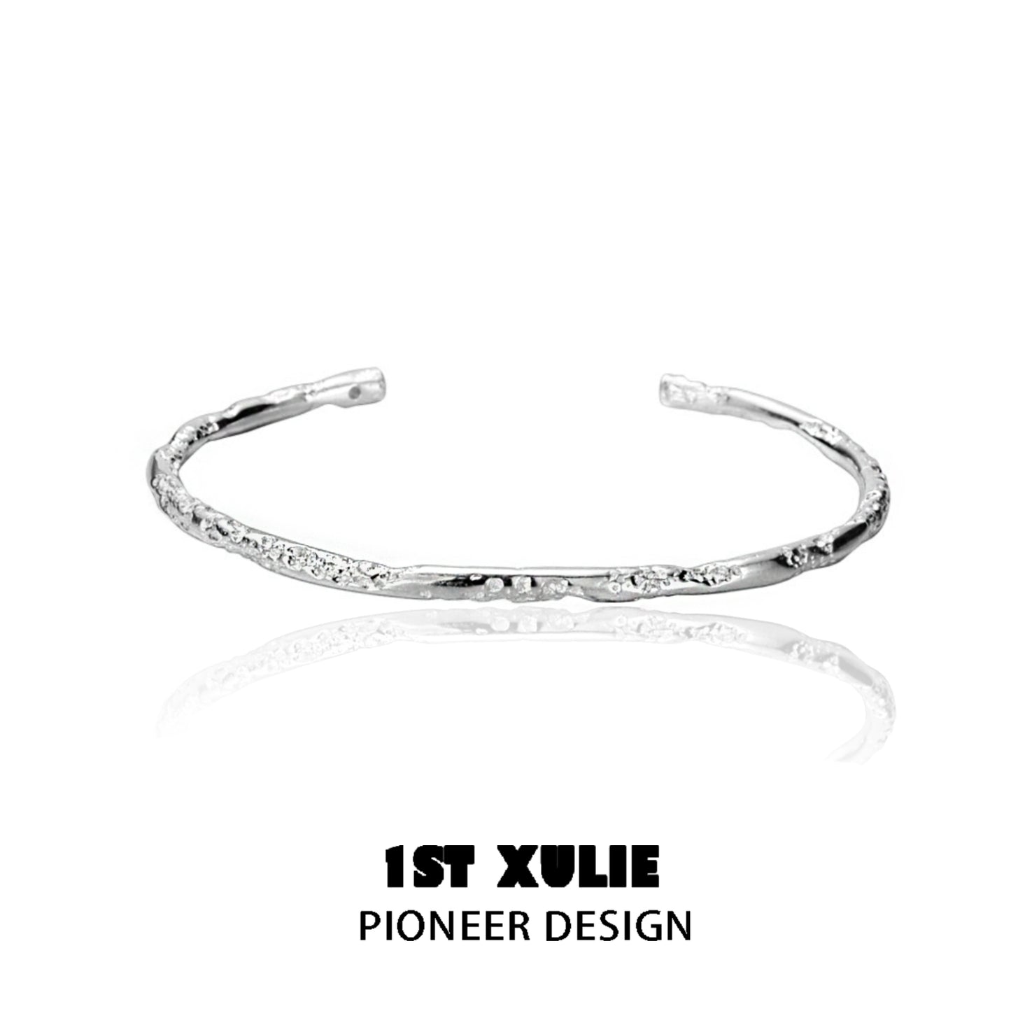 Sleek minimalist silver bracelet by 1STXULIE with a textured design for everyday elegance