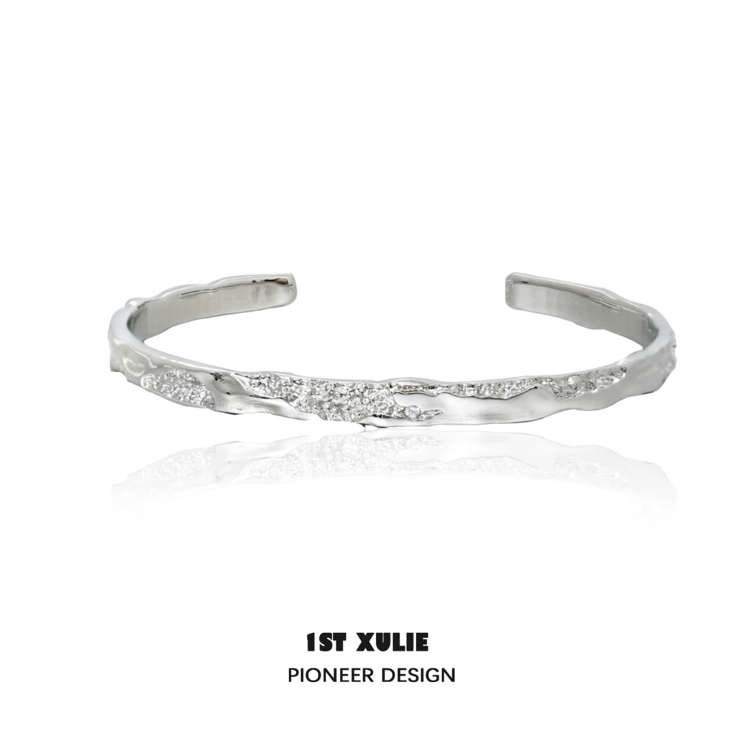 1ST XULIE minimalist silver bracelet with a sleek, modern design and subtle texture