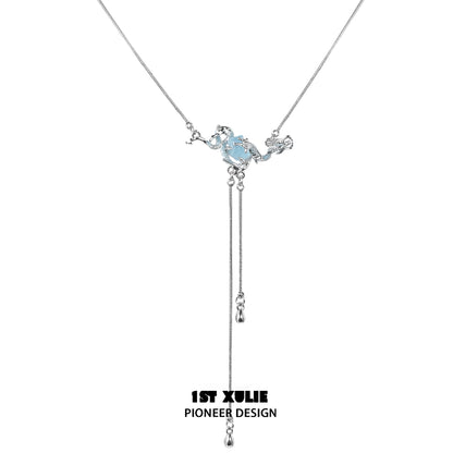 Elegant moon double necklace by 1STXULIE featuring a blue gemstone and stylish drop design