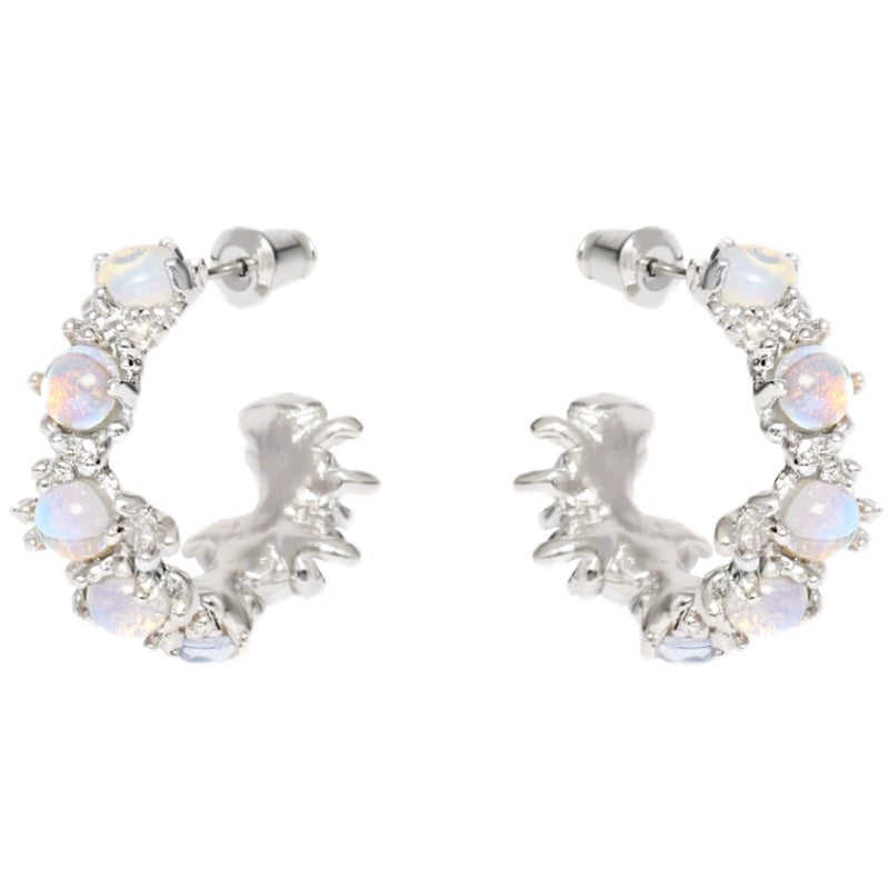 Elegant silver moonstone hoop earrings adorned with shimmering stones for a stylish look
