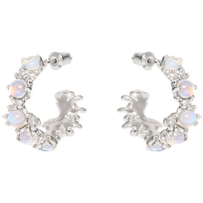 Elegant silver moonstone hoop earrings adorned with shimmering stones for a stylish look