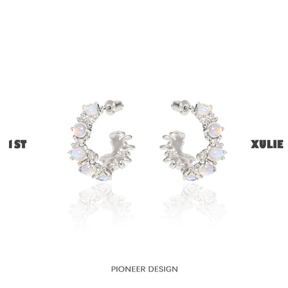 Elegant silver moonstone hoop earrings adorned with sparkling stones for a chic look