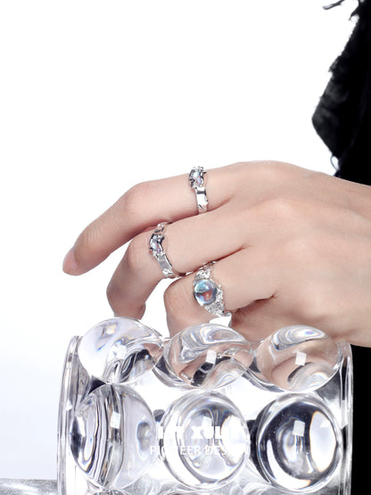 Elegant moonstone silver ring displayed on a hand, showcasing its unique gemstone design and shine