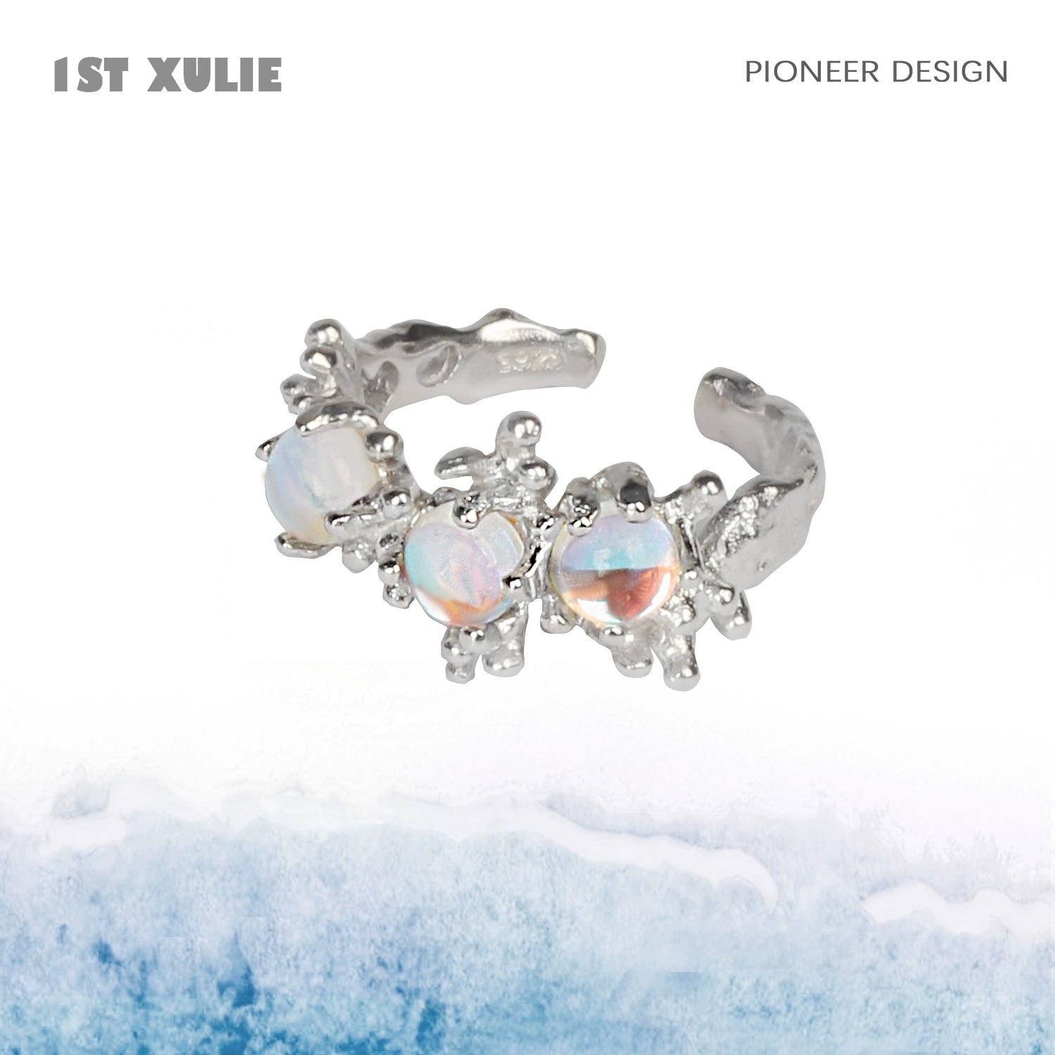 Elegant moonstone silver ring featuring three beautiful gemstones with a unique design