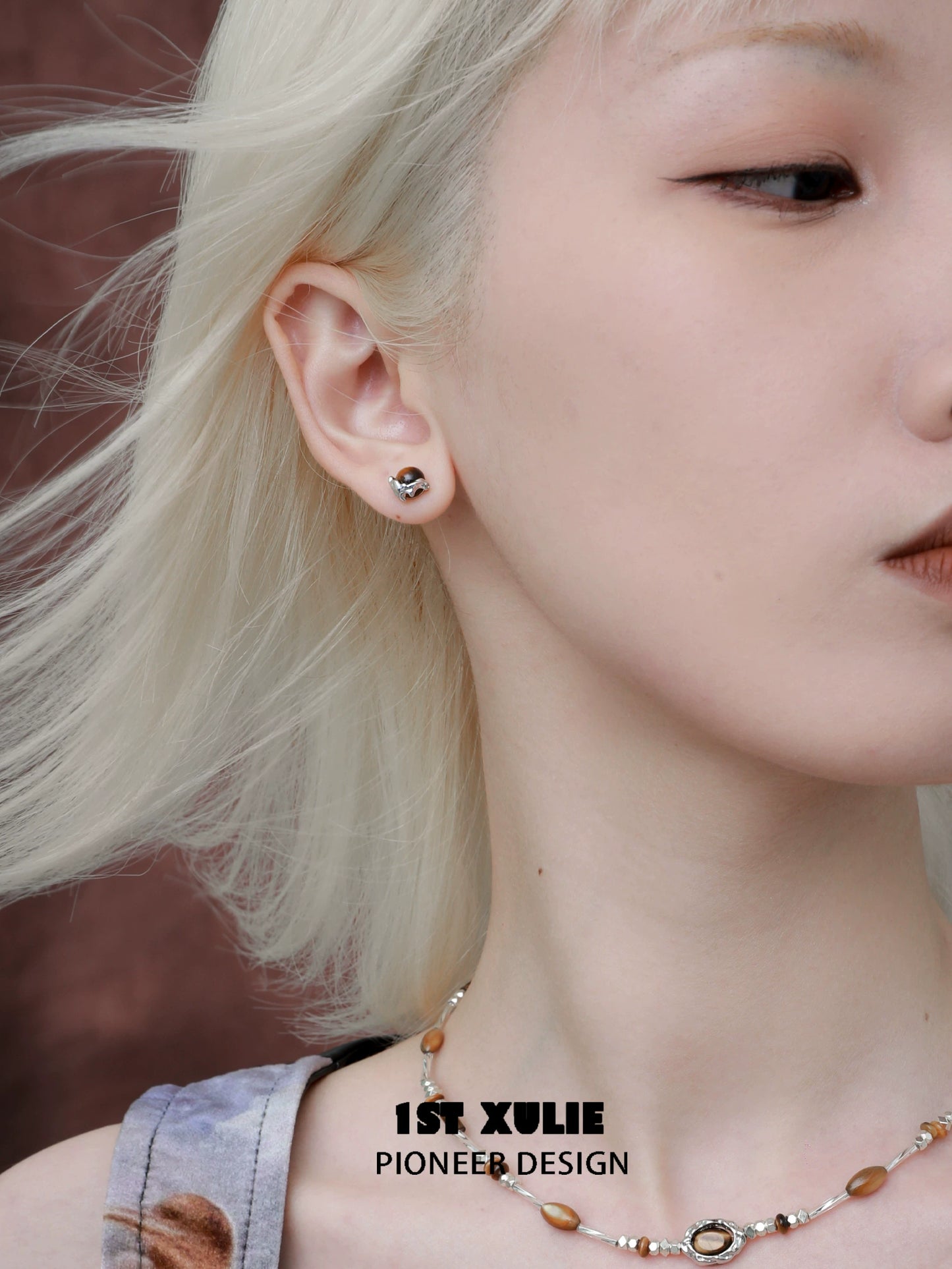 Mystic eye earrings by 1ST XULIE featuring a unique design, perfect for adding a mystical touch