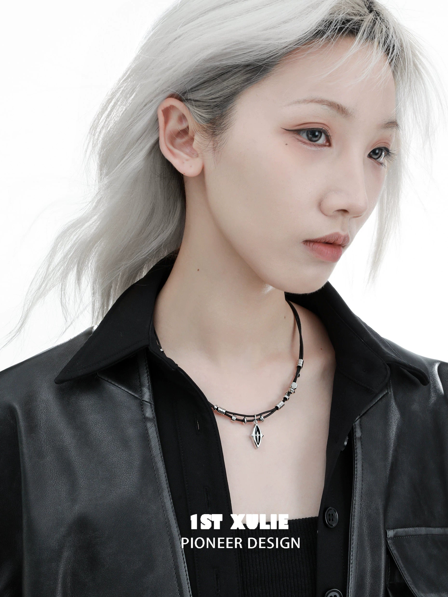 Model wearing a northern star beaded leather necklace with a sleek design and striking details