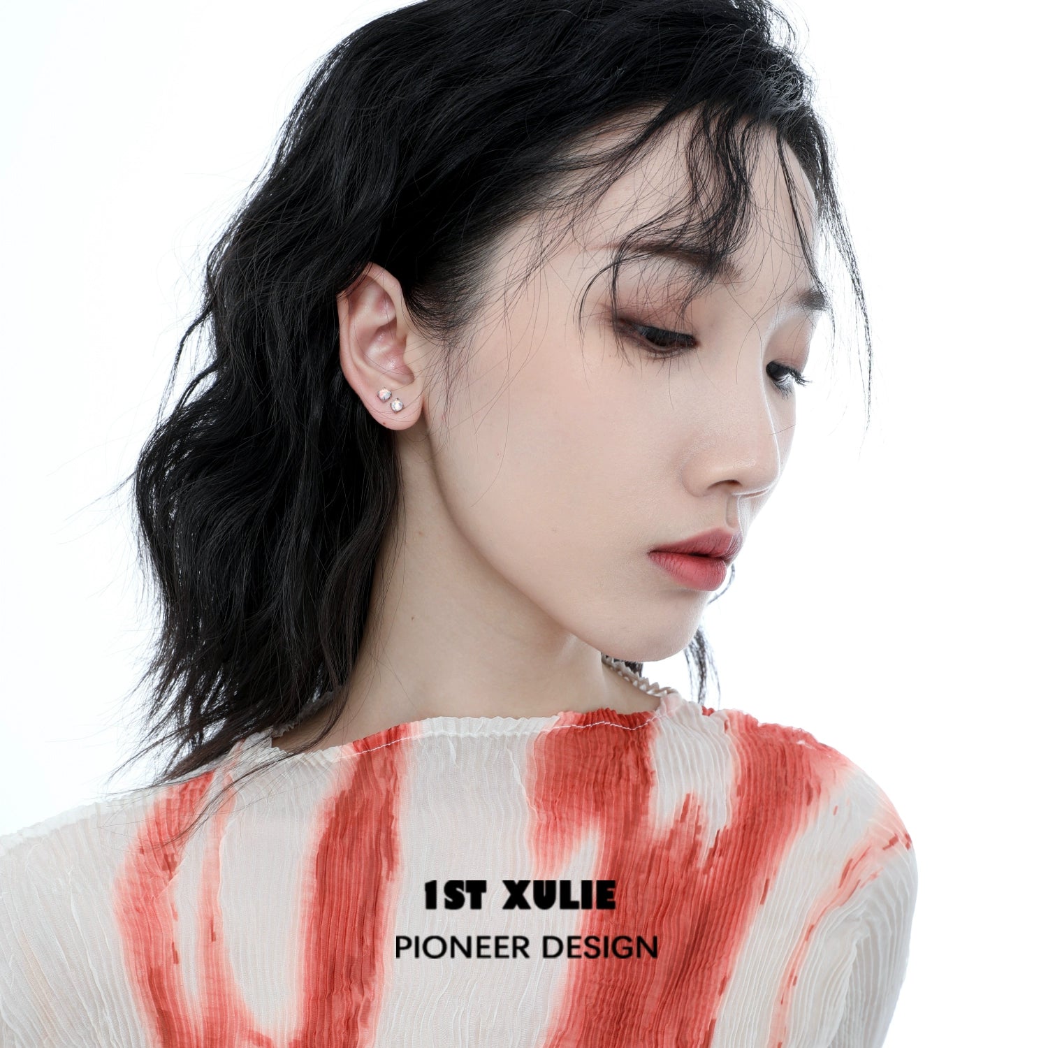 Model wearing elegant 1ST XULIE opal stud earrings that add a touch of sophistication