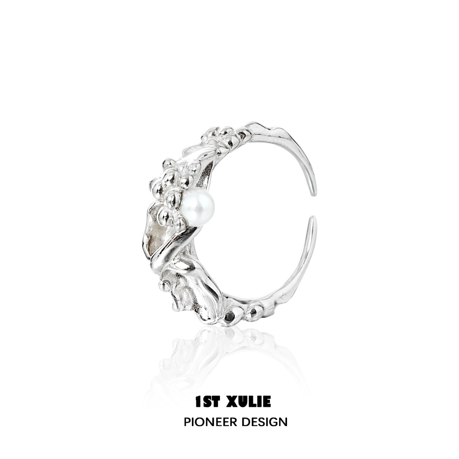 Unique 1STXULIE pearl silver ring featuring intricate detailing and a single pearl accent