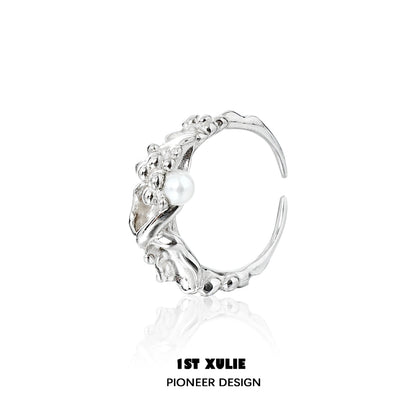 Unique 1STXULIE pearl silver ring featuring intricate detailing and a single pearl accent
